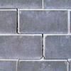 A diagonal stair-step crack found along a foundation wall in a Blacksburg home