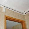 The ceiling and wall separating as the wall sinks with the slab floor in a Charlottesville home