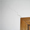 wall cracks along a doorway in a Falls Church home.