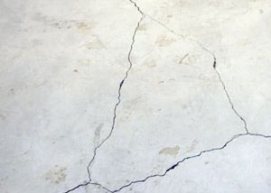 cracks in a slab floor consistent with slab heave in Charlottesville.