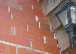 a repaired chimney in Harrisonburg that had shown serious foundation damage and was repaired with a helical pier system.