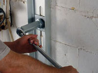 Mounting a foundation wall channel anchor in Silver Spring.