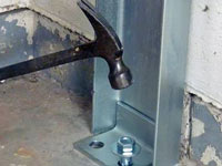 Mounting a foundation channel anchor installation to the floor in Silver Spring.