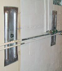 A foundation wall anchor system used to repair a basement wall in Salem