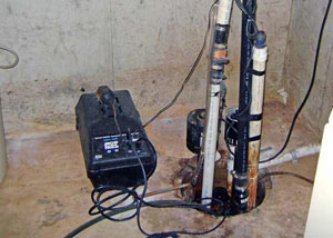 Pedestal sump pump system installed in a home in Forest