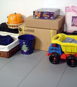 A concrete basement floor protected by our waterproof basement sub floor in Bethesda, VA & MD