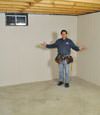 Silver Spring basement insulation covered by EverLast™ wall paneling, with Foamax insulation underneath