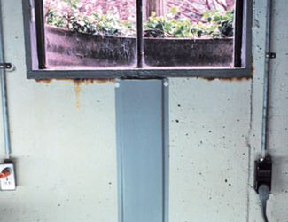 Repaired waterproofed basement window leak in Roanoke